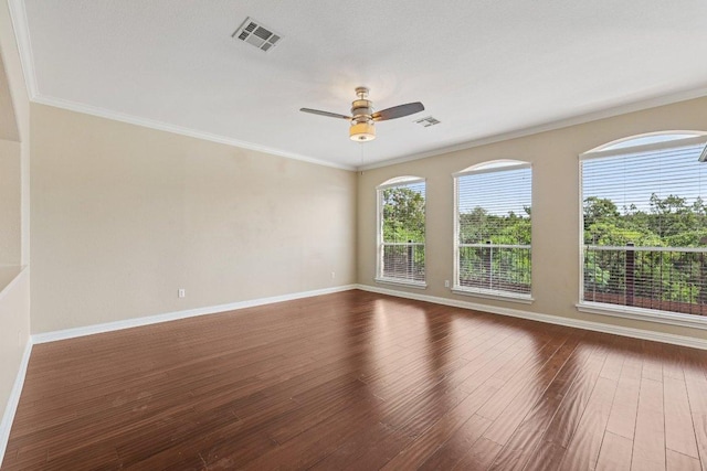 11421 Dona Villa Dr, Austin, TX 78726 - empty room with a ceiling fan, wood finished floors, and ornamental molding
