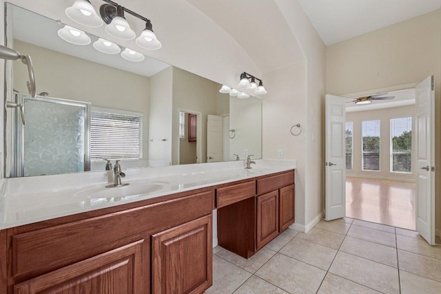 11421 Dona Villa Dr, Austin, TX 78726 - bathroom featuring tile patterned floors, double vanity, a shower, and ceiling fan