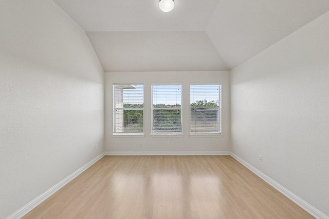 11421 Dona Villa Dr, Austin, TX 78726 - unfurnished room with lofted ceiling and light wood-style floors