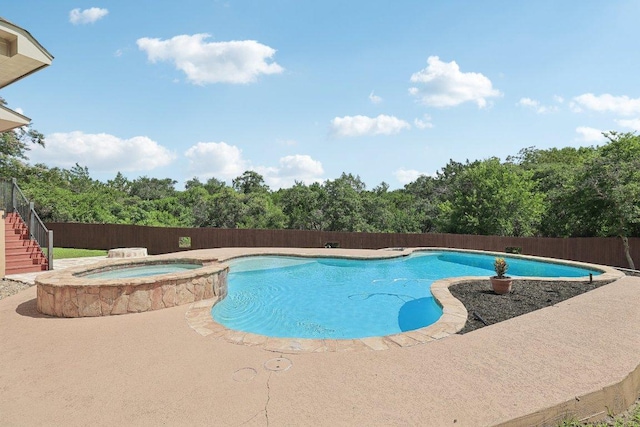 11421 Dona Villa Dr, Austin, TX 78726 - view of pool with stairway, a pool with connected hot tub, and a fenced backyard
