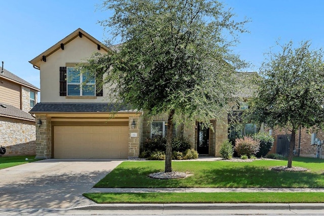 1702 Ambling Trl, Cedar Park, TX 78613 - view of front facade with concrete driveway, stone siding, a front yard, a garage, and stucco siding