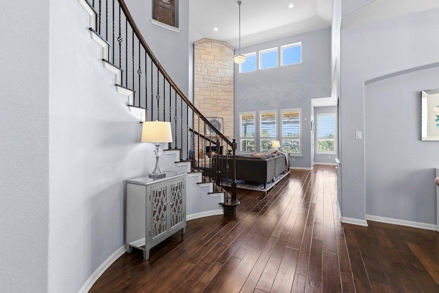 1702 Ambling Trl, Cedar Park, TX 78613 - foyer entrance featuring a towering ceiling, wood-type flooring, and stairs