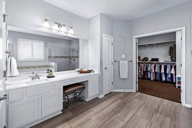 1702 Ambling Trl, Cedar Park, TX 78613 - full bath featuring a shower stall, a walk in closet, and vanity