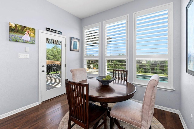 1702 Ambling Trl, Cedar Park, TX 78613 - dining room with healthy amount of natural light and dark wood finished floors