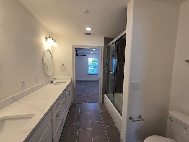 2105 Tiger Trl Unit 701, Round Rock, TX 78664 - full bath with double vanity, tile patterned floors, and enclosed tub / shower combo