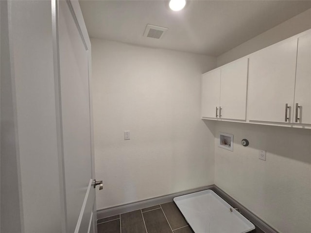 2105 Tiger Trl Unit 701, Round Rock, TX 78664 - washroom featuring cabinet space and hookup for a washing machine
