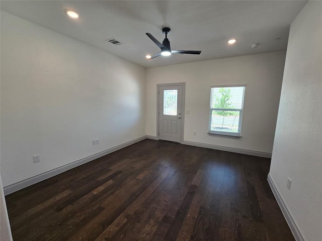 2105 Tiger Trl Unit 701, Round Rock, TX 78664 - empty room featuring dark wood finished floors, a ceiling fan, and recessed lighting