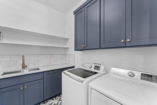 21408 Lakefront Dr, Lago Vista, TX 78645 - washroom with cabinet space and separate washer and dryer