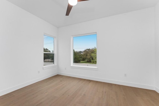 21408 Lakefront Dr, Lago Vista, TX 78645 - spare room featuring wood finished floors and ceiling fan