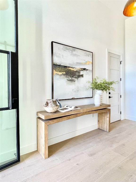 21408 Lakefront Dr, Lago Vista, TX 78645 - unfurnished office featuring light wood-type flooring and baseboards