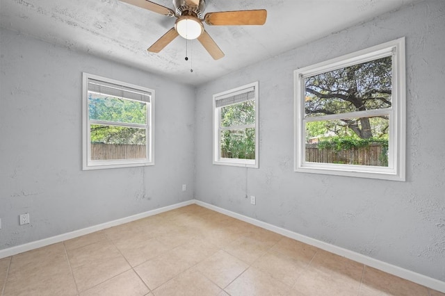 8 Spalding Cir, Wimberley, TX 78676 - empty room featuring ceiling fan and light tile patterned flooring