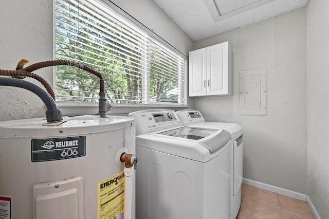 8 Spalding Cir, Wimberley, TX 78676 - washroom featuring water heater, electric panel, washer and clothes dryer, cabinet space, and light tile patterned floors