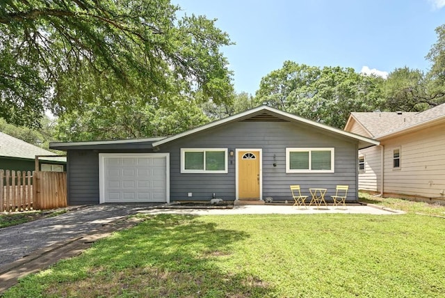 8 Spalding Cir, Wimberley, TX 78676 - view of front of house featuring asphalt driveway and a garage