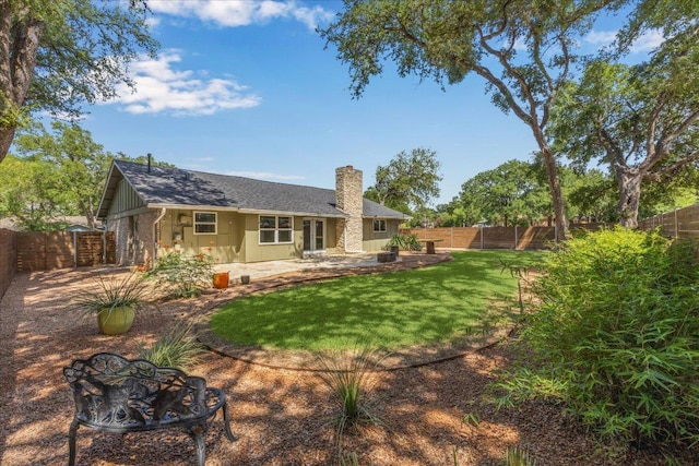 2701 Coatbridge Dr, Austin, TX 78745 - back of house featuring a chimney, a patio area, a fire pit, a fenced backyard, and board and batten siding