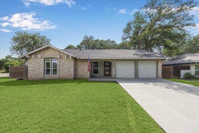 2701 Coatbridge Dr, Austin, TX 78745 - ranch-style house with driveway, a garage, a front yard, and stone siding