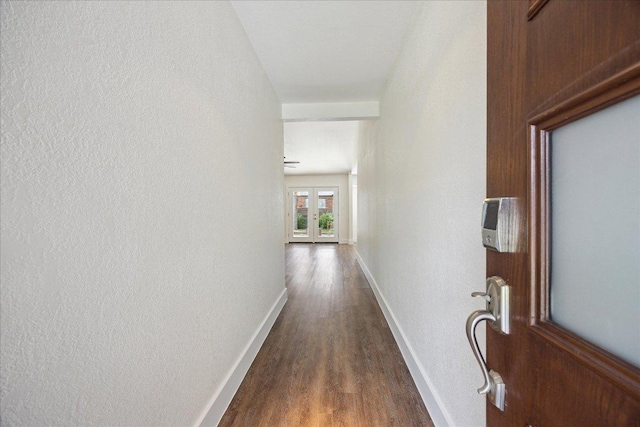 2701 Coatbridge Dr, Austin, TX 78745 - hallway with dark wood-type flooring and baseboards