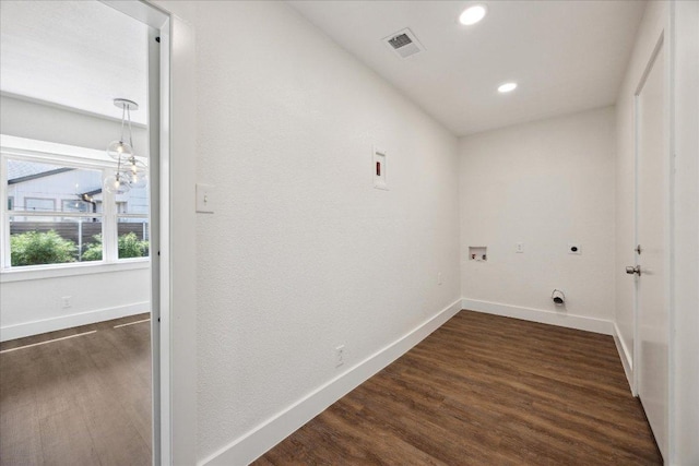 2701 Coatbridge Dr, Austin, TX 78745 - washroom with electric dryer hookup, dark wood-type flooring, washer hookup, and recessed lighting