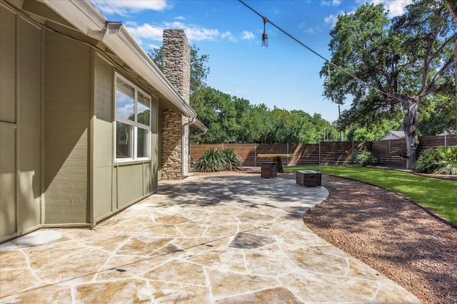 2701 Coatbridge Dr, Austin, TX 78745 - fenced backyard with a patio area