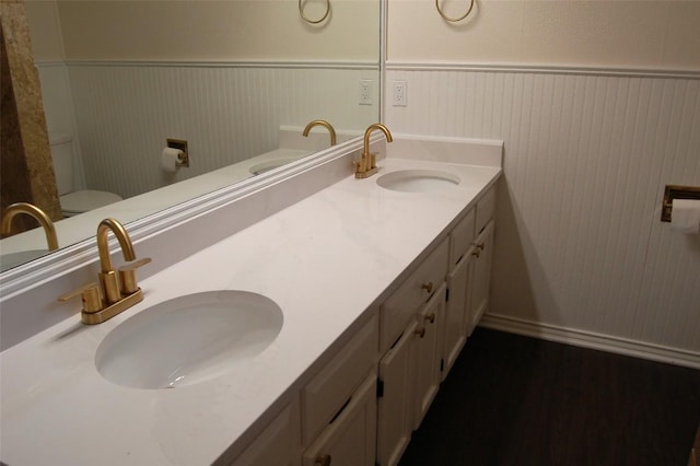 12615 Dove Valley Trl, Austin, TX 78729 - full bath with a wainscoted wall and double vanity