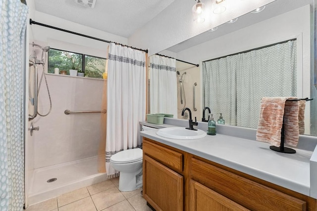 11901 Swearingen Dr Unit 43-I, Austin, TX 78758 - bathroom featuring tile patterned flooring, vanity, and curtained shower
