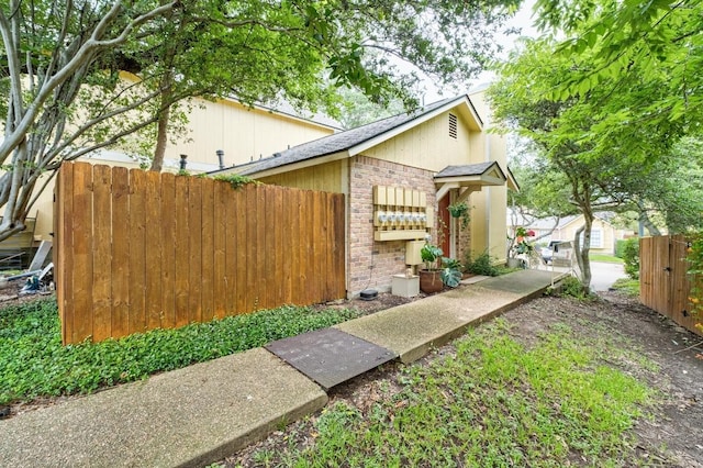 11901 Swearingen Dr Unit 43-I, Austin, TX 78758 - view of side of property with brick siding
