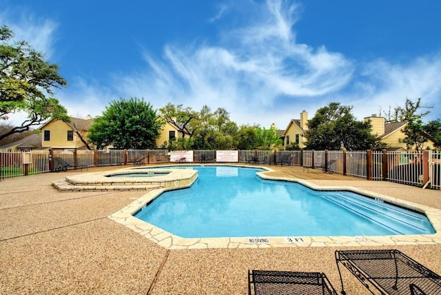 11901 Swearingen Dr Unit 43-I, Austin, TX 78758 - community pool with a community hot tub and a patio