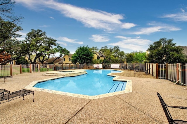 11901 Swearingen Dr Unit 43-I, Austin, TX 78758 - community pool featuring a hot tub and a patio