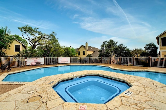 11901 Swearingen Dr Unit 43-I, Austin, TX 78758 - community pool featuring a community hot tub