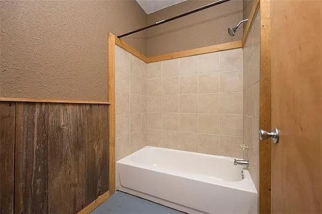 4901 County Road 210, Bertram, TX 78605 - full bath featuring shower / bath combination and a textured wall