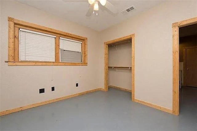 4901 County Road 210, Bertram, TX 78605 - unfurnished bedroom with finished concrete flooring, a closet, and ceiling fan