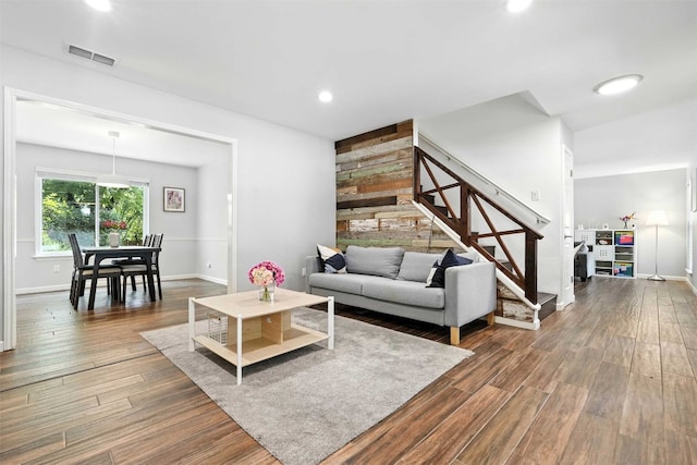 7314 Danwood Dr, Austin, TX 78759 - living room featuring wood finished floors, stairway, and recessed lighting