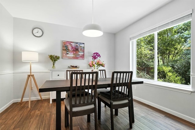 7314 Danwood Dr, Austin, TX 78759 - dining room featuring wood finished floors and baseboards