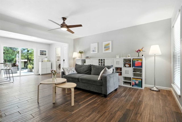 7314 Danwood Dr, Austin, TX 78759 - living room with washer / clothes dryer, a ceiling fan, and dark wood-style floors