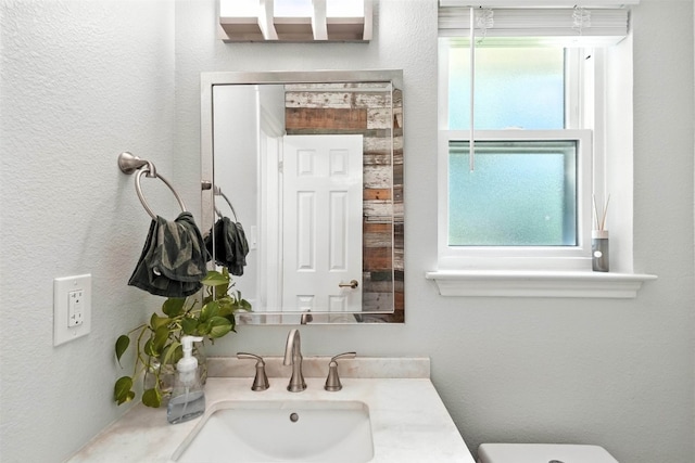7314 Danwood Dr, Austin, TX 78759 - bathroom with plenty of natural light and vanity