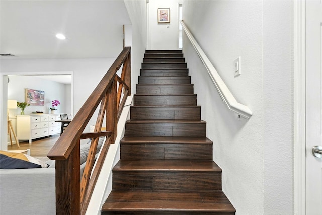 7314 Danwood Dr, Austin, TX 78759 - stairway featuring wood finished floors