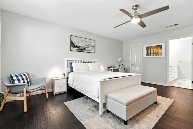 7314 Danwood Dr, Austin, TX 78759 - bedroom featuring hardwood / wood-style flooring, connected bathroom, and a ceiling fan