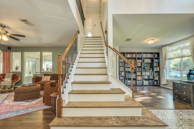 1104 Woodhollow Ln, Cedar Park, TX 78613 - stairs featuring ceiling fan and wood finished floors
