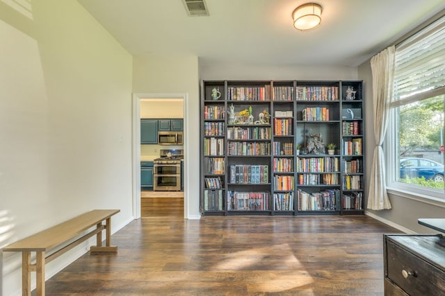 1104 Woodhollow Ln, Cedar Park, TX 78613 - sitting room with wood finished floors and baseboards