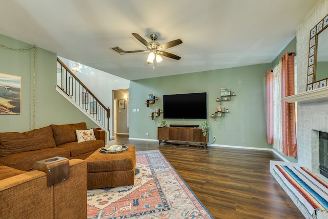 1104 Woodhollow Ln, Cedar Park, TX 78613 - living area featuring a fireplace, wood finished floors, a ceiling fan, and stairs