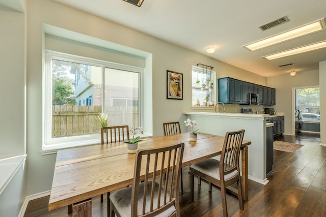 1104 Woodhollow Ln, Cedar Park, TX 78613 - dining room featuring dark wood-style floors
