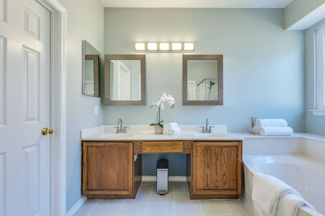 1104 Woodhollow Ln, Cedar Park, TX 78613 - bathroom featuring a garden tub, double vanity, and a shower
