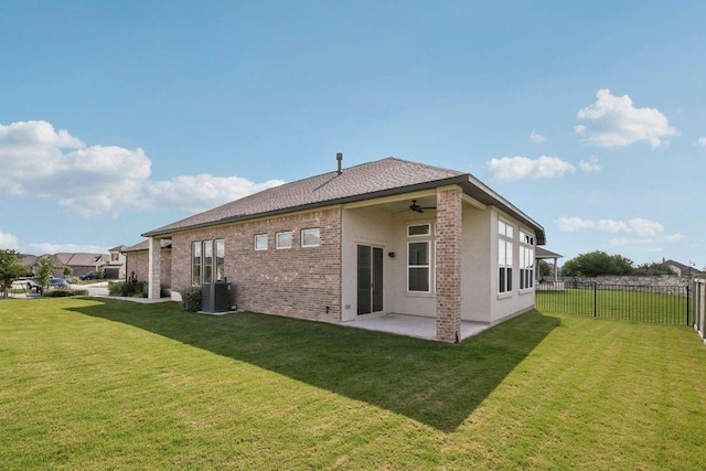 181 Benedum Way, Liberty Hill, TX 78642 - back of property featuring a ceiling fan, stucco siding, a patio, brick siding, and a shingled roof