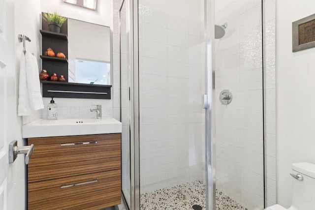 13008 Medina River Way, Austin, TX 78732 - bathroom with a shower stall and vanity