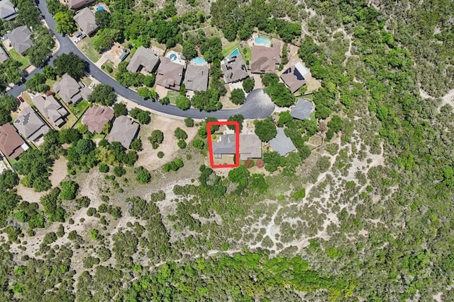 13008 Medina River Way, Austin, TX 78732 - aerial view of property and surrounding area with property boundaries highlighted and nearby suburban area