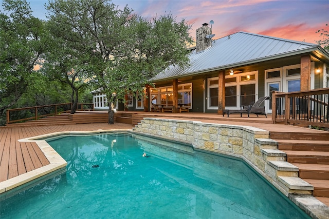 24205 State Highway 71 W, Spicewood, TX 78669 - outdoor pool featuring a wooden deck and a ceiling fan