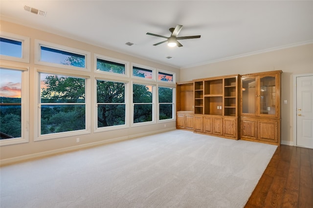 24205 State Highway 71 W, Spicewood, TX 78669 - unfurnished living room with a ceiling fan, light wood-style flooring, and ornamental molding