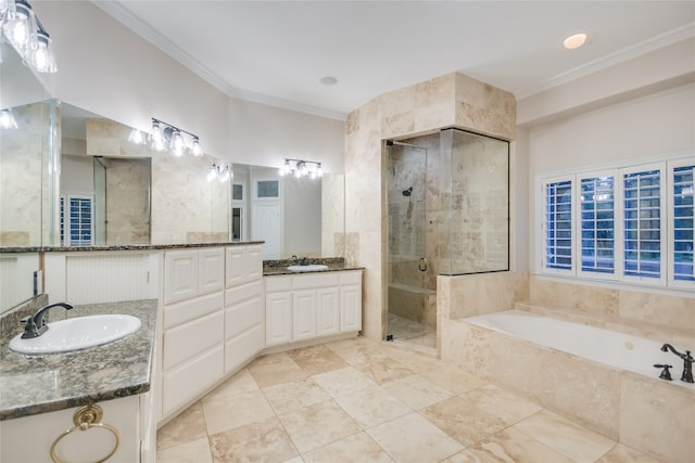 24205 State Highway 71 W, Spicewood, TX 78669 - bathroom featuring a stall shower, a garden tub, ornamental molding, and vanity