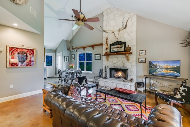 24205 State Highway 71 W, Spicewood, TX 78669 - living area with high vaulted ceiling, ceiling fan, and a stone fireplace