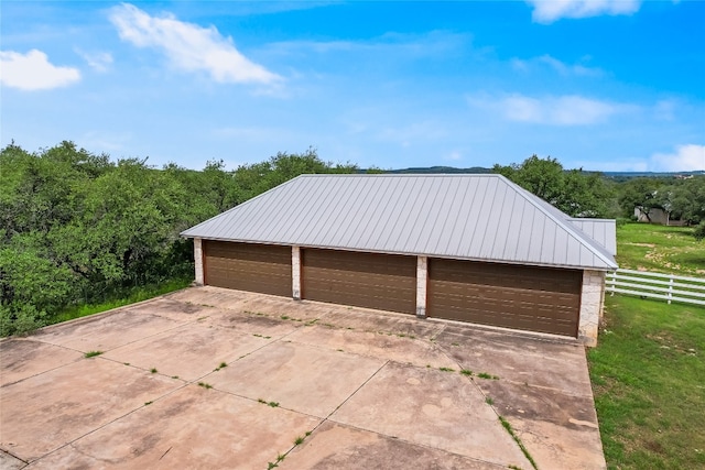 24205 State Highway 71 W, Spicewood, TX 78669 - detached garage featuring concrete driveway