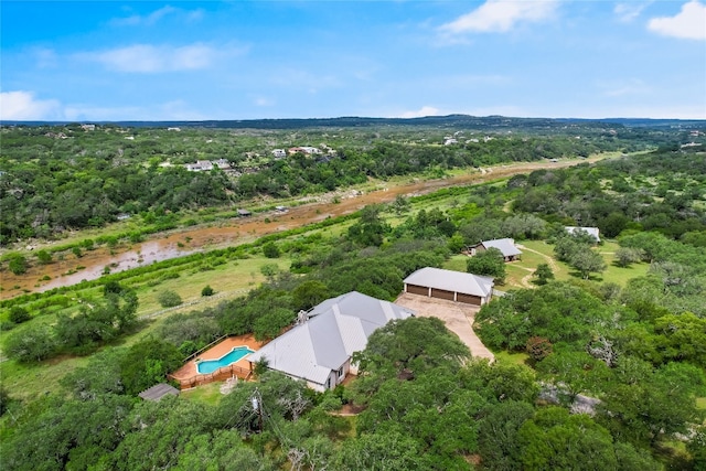 24205 State Highway 71 W, Spicewood, TX 78669 - aerial overview of property's location featuring a forest and a pool
